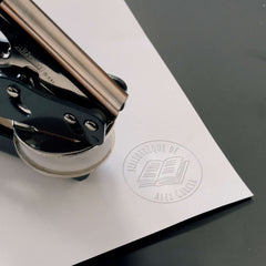 Embosser ex libris libro aperto