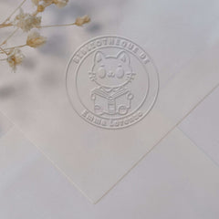 Embosser ex libris gatto lettore