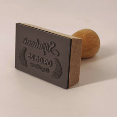 Timbro battesimo ramo di foglie decorative