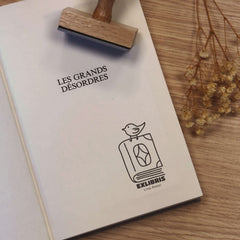 Timbro ex libris uccello sul libro