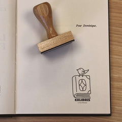 Timbro ex libris uccello sul libro