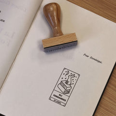 Timbro ex libris coniglio sul libro