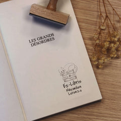 Timbro ex libris gatto sui libri
