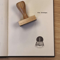 Timbro ex libris libro e candela
